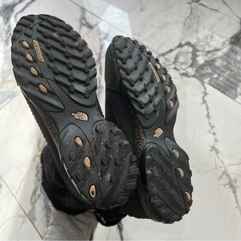The North Face Women's Black Primaloft Winter Boots with fur & snowflake design